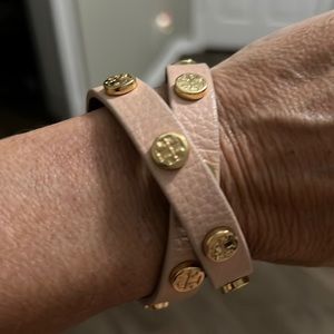 Tory Burch pink leather with gold wrap bracelet.